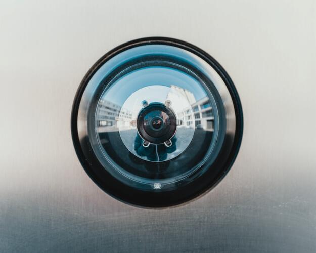 Wall camera at the entrance to a building