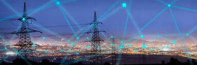 Pylons with cityscape in background