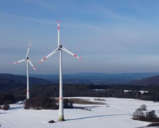 Wind turbines in a snowy landscape